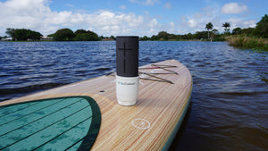 E-Sea Cup Original-Suction Mounted Cup Holder-White Holding Wireless Speaker On Paddle Board